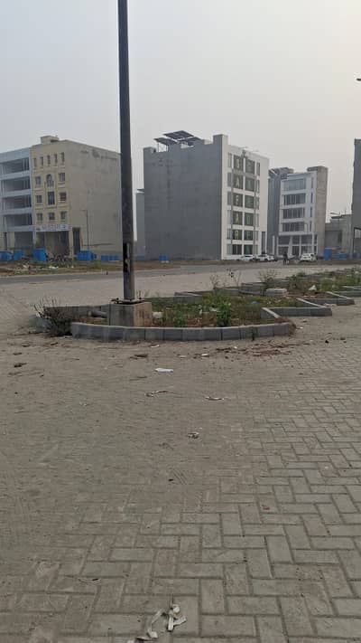 Brand New 8 Marla Plaza DHA Phase 8 | Facing Parking