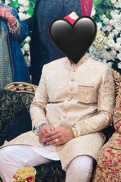 cream golden shairwani in very good condition