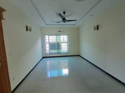 A beautiful upper portion for rent ideal location All marble flooring near to market close to double road Big parking separate gate