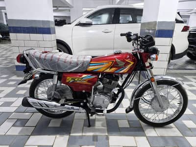 honda 125 red in new condition