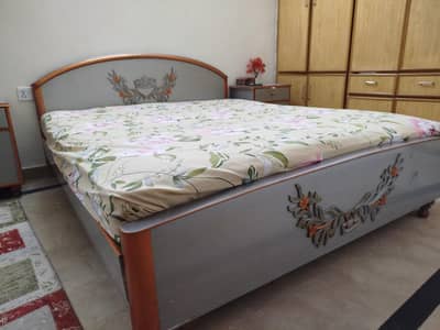 Queen size bed with side table and spring matrix extra storage boxes