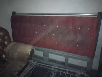 a wooden used bed in good condition for sale in urgent basis