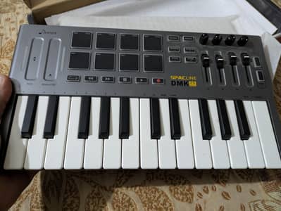 DMK 25 mini piano