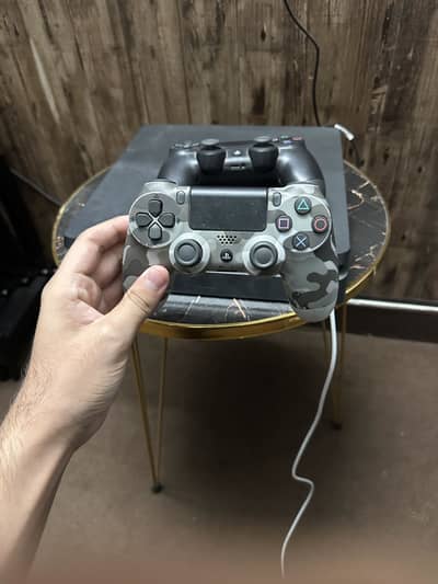 PS4 slim 1 TB with 2 remotes