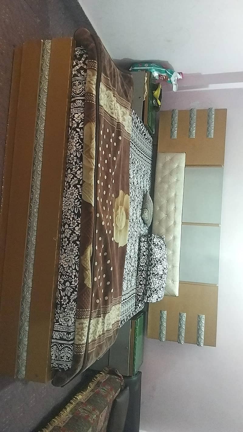 double bed with side table 0