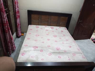 double bed and dressing table with mattres.