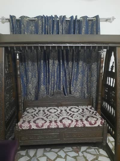 Wooden chinioti swing