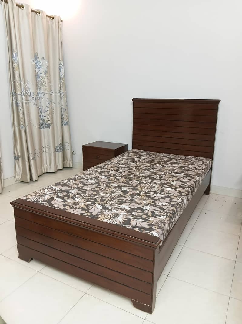 single bed with side table 1