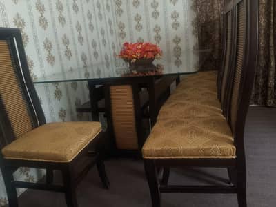 dinning table and ottoman chairs