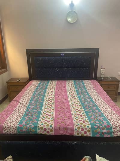 Bed with spring mattress for sale