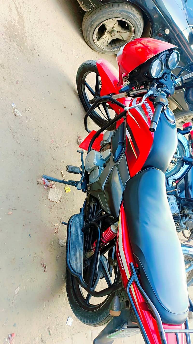 unique 100 cc self start with alloy rim. . exchange possible 1