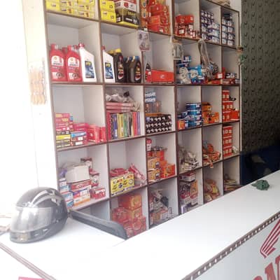 Auto parts and rack with counter and chair