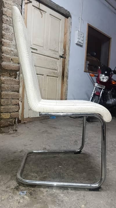 Elegant White Leatherette steel dining /Office Chair in Good Condition
