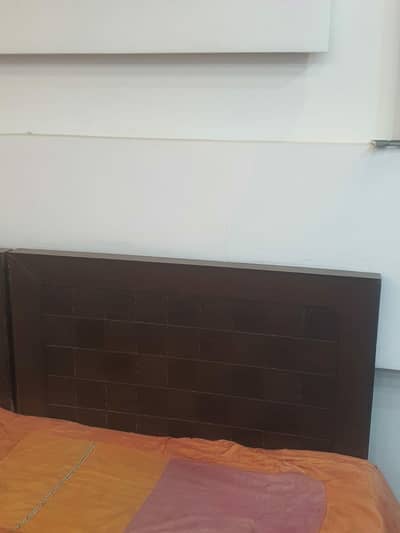 single bed in brown colour