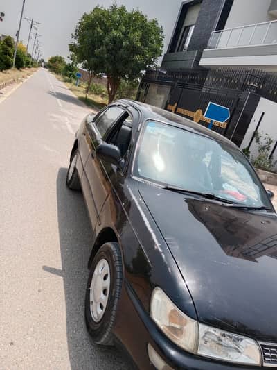 Toyota Corolla 96 model.  Bulbul ka bacha