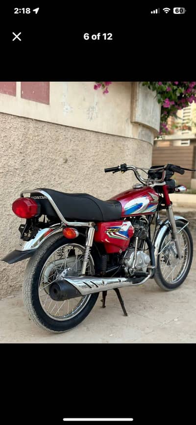 Honda 125 karachi number tanki tappy new pic me old wala hain