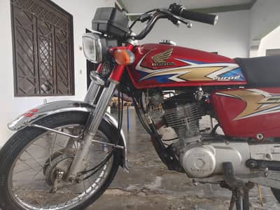 Honda 125 colar red candition 8/10