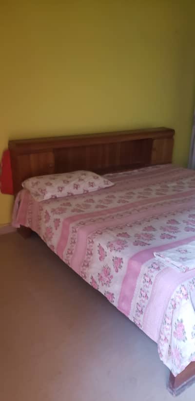 Wooden Bed for sale - with mattress ( Price Negotiable)