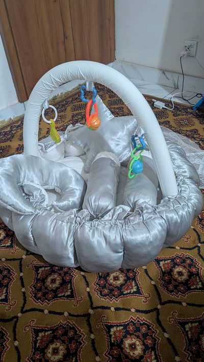 baby nest with mosquito net