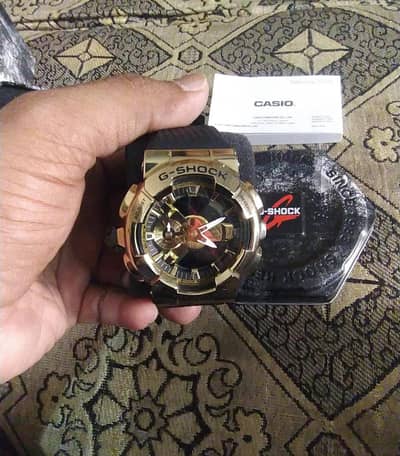 G-Shock Casio golden metal watch