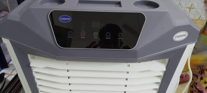 canon new touch air cooler  with remote + 4 bottle thande Pani Ki