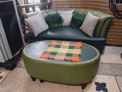 2 seater sofa with cushions and table