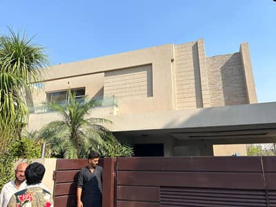SYED BROTHERS PROUDLY OFFERS: 1-Kanal Elegant And Fully Maintained Bungalow Is Available In The Best Block Of DHA Lahore.
