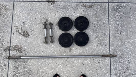 4x3kg rubber plates , 2x dumbbell rods , 1x5ft barbell rod barely used