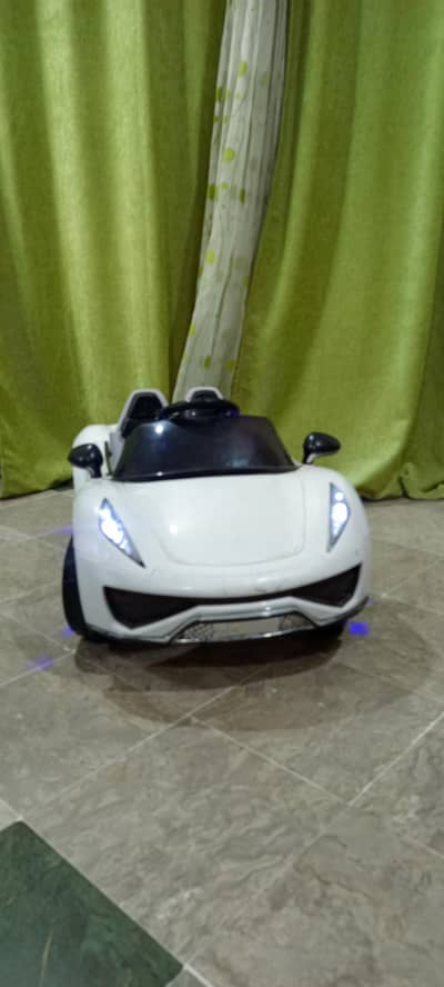 White Kids Electric Ride-On Sports Car – Used, Good Condition
