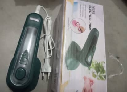 Portable hand iron