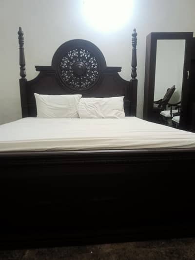 wooden chinioti and carved bed