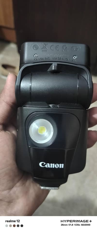 Speed light 320EX (Cannon)