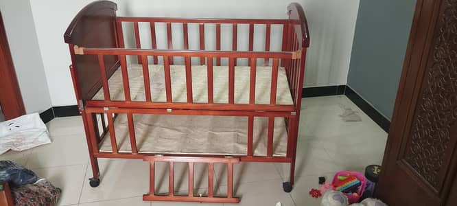 Tinnies Brand Brown color wooden Cot