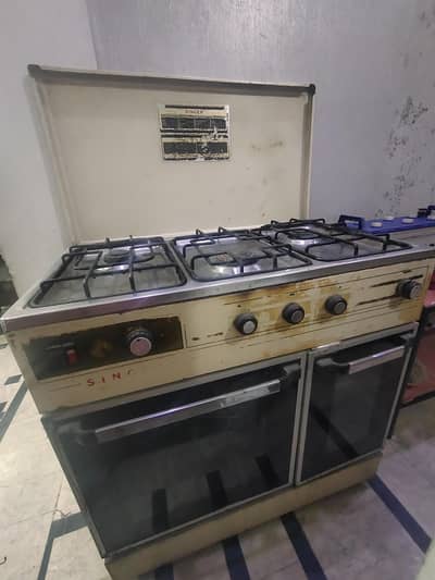 Used Gas cooking range for sale with BBQ accessories and hot cabnit
