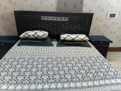 bed with two sidetables