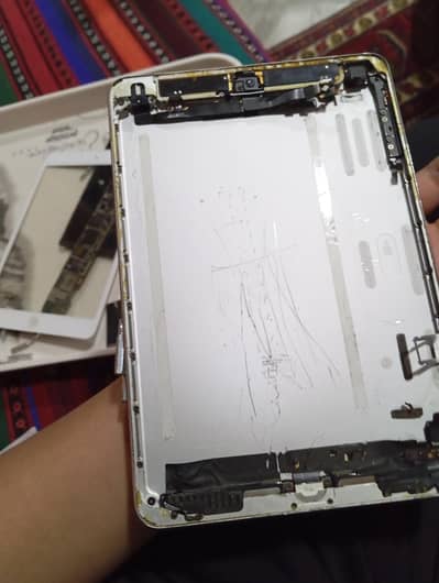 collectable iPad mini 1 parts open without battery doesn't work