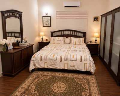 Elegant wooden bedroom set available for sale in excellent condition.