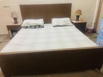 Bed with side tables
