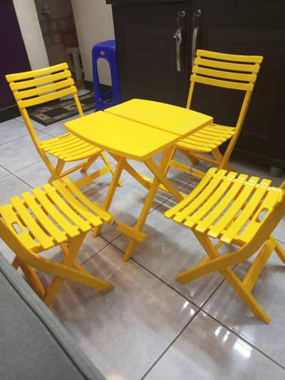 1 table and four chair set for kids