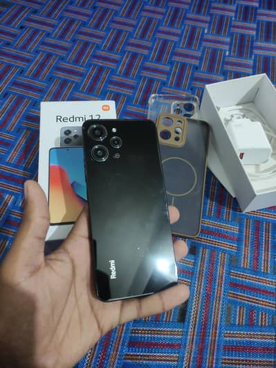 Xiaomi Redmi 12 8/128 with box charger  exchange possible. . 03271060622