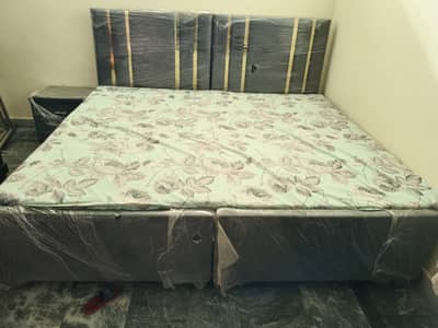 Single beds with side table