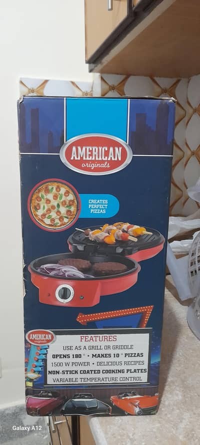Pizza Maker & Multigrill bought from UK £65 (Rs. 25,000)