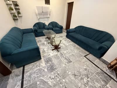 8 seater sofa and 2 tables
