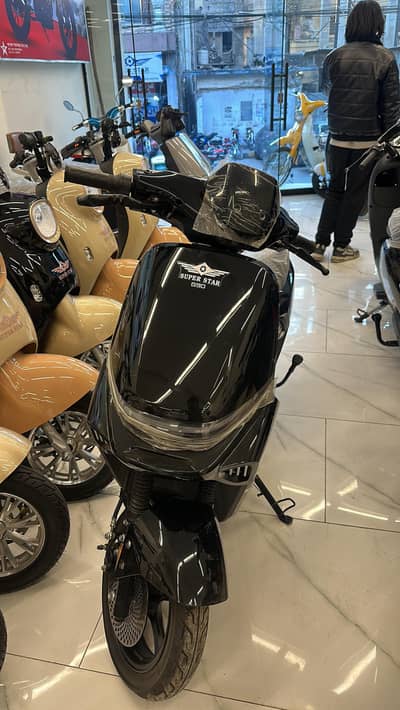 super star electric scooty