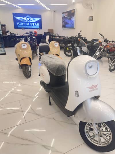 super star electric scooty