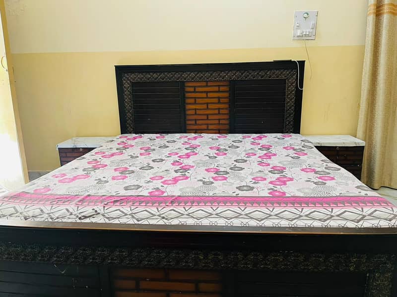 double bed with side table 4