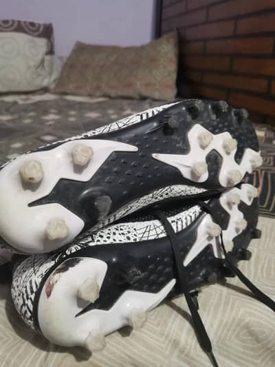  Professional Football Boots – Black Edition – Rs. 11K