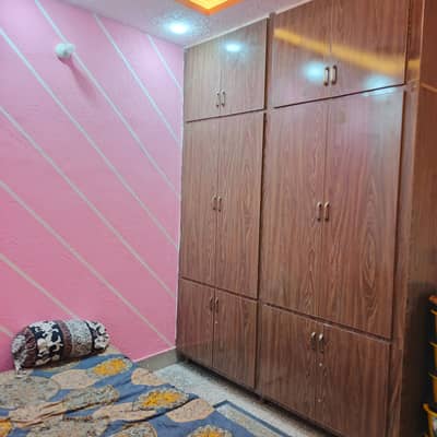 Top floor house available for rent in afsha colony near range road Rwp