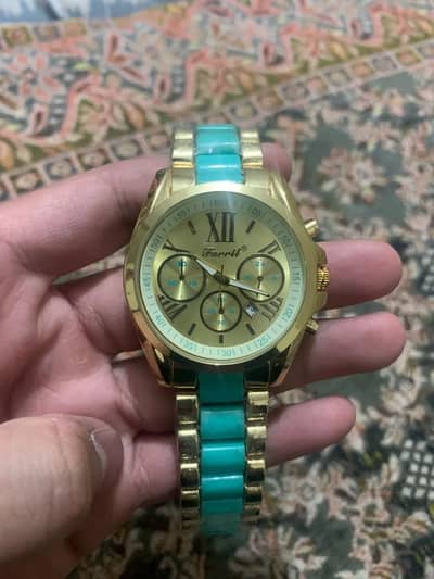 Gold Roman Dial Chronograph Watch with Turquoise Bracelet
