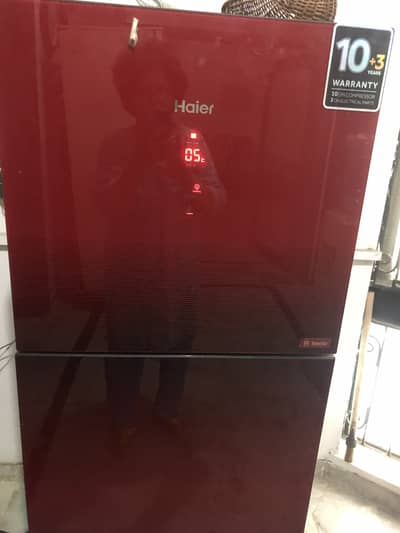 Heir  Refrigerator , medium siz, like new  Two door freezer and fr